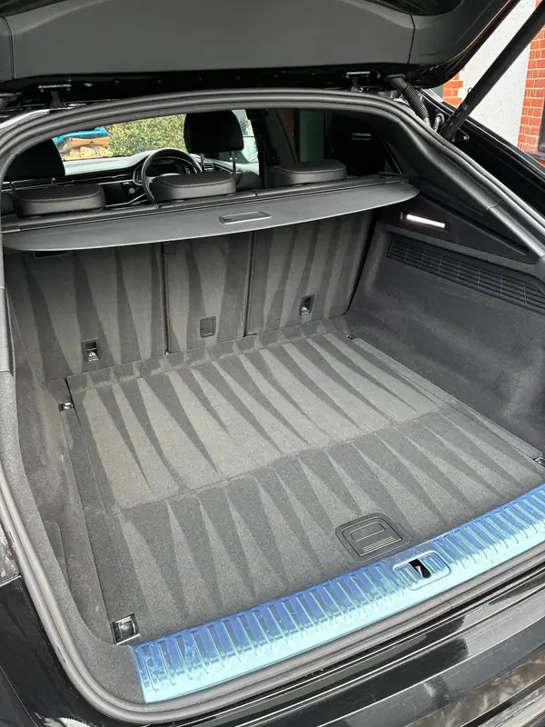 Audi boot carpet after hot-water extraction, with clean stripes across the carpet